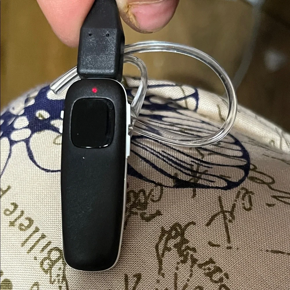 Black Bluetooth Earset with Clear Ear Hook and USB Charging Cable